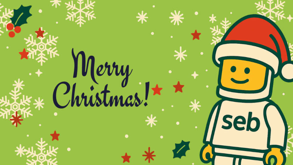 EBS Lego man character in a Santa hat standing next to text reading "Merry Christmas!" on a green background